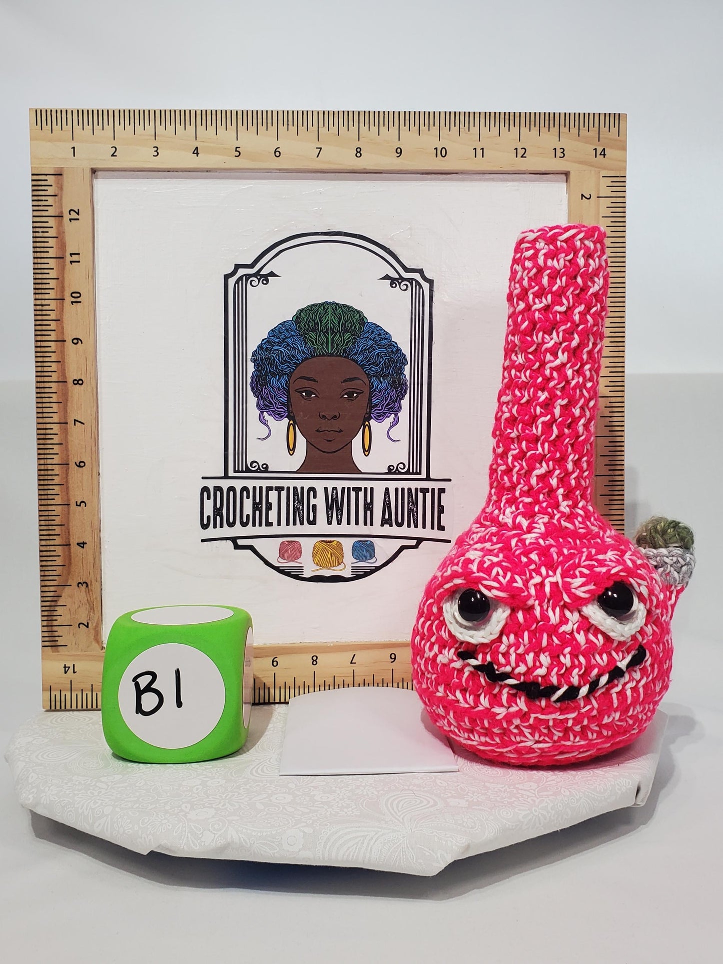 B1: Crochet Bong, Pink and White - GLOWS IN DARK, made with acrylic and cotton yarn, has safety eyes, approx. 10" x 5", 8 oz