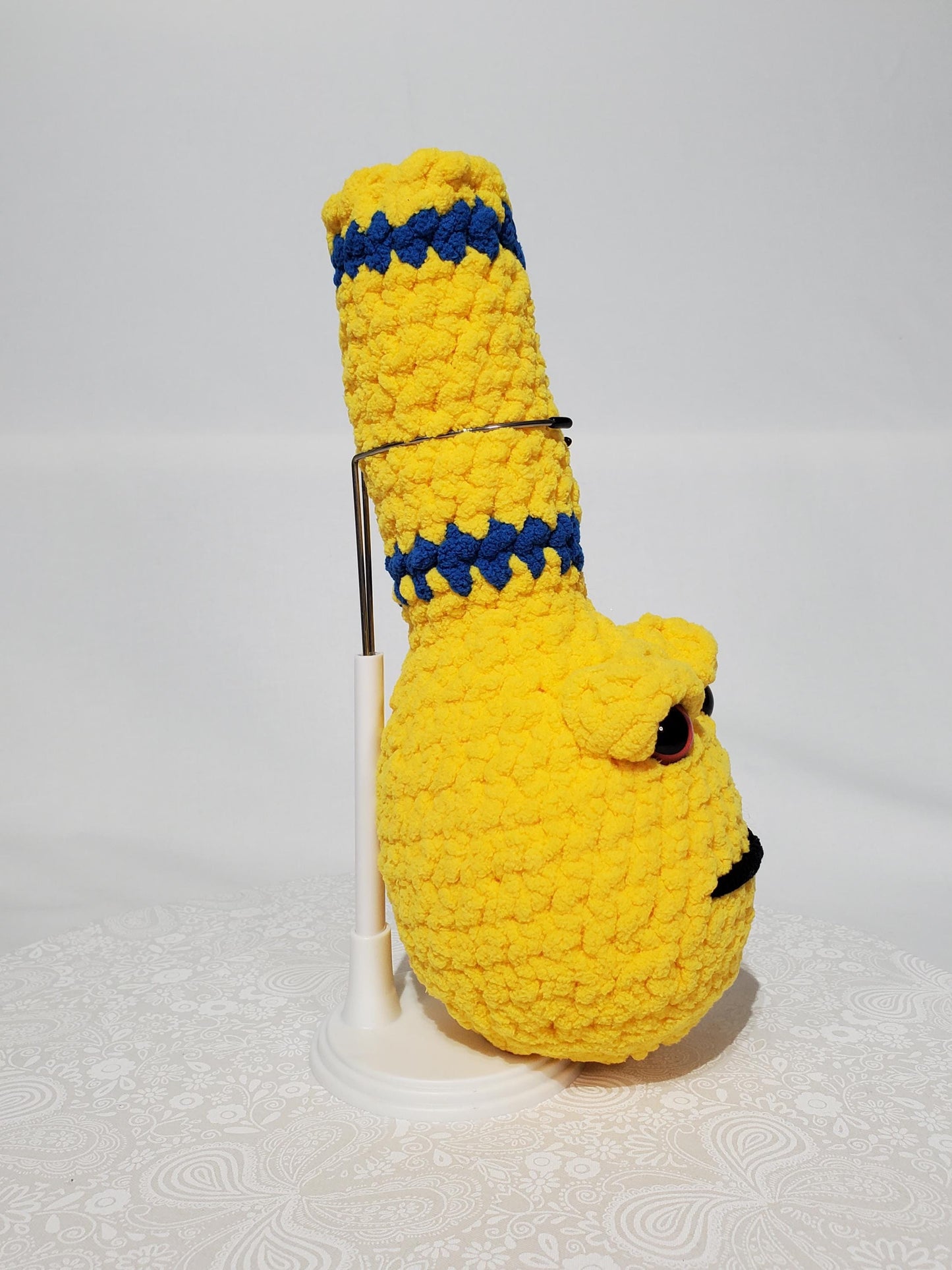 B3: Crochet Bong, yellow and blue, made with 100% polyester, soft blanket yarn, has safety eyes, 10" x 4", 5 oz
