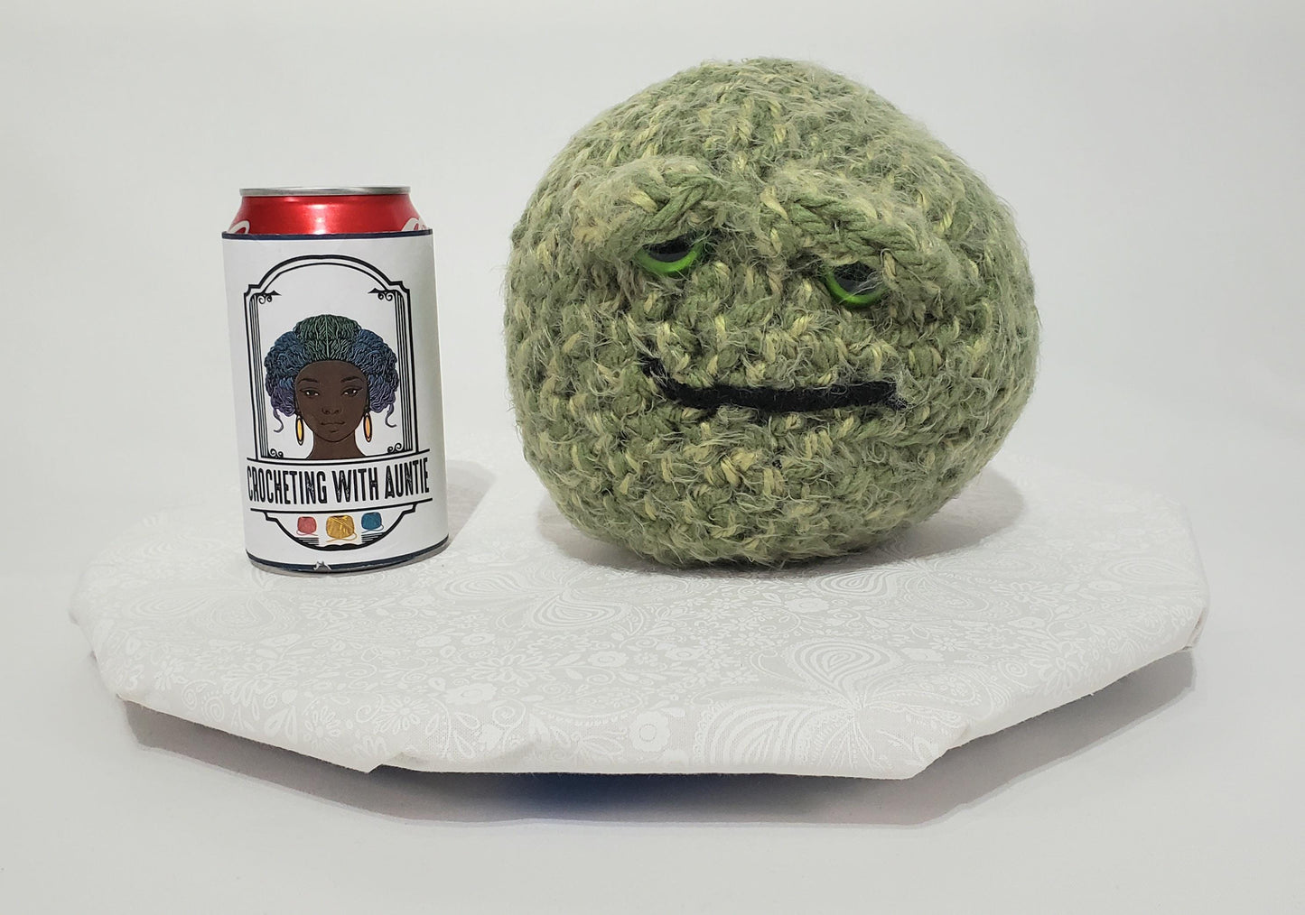 N7: Crochet 420 Nugget made with acrylic and polyester yarn, safety eyes and polyester fiber fill, approx. 6x6, approx. 10 oz.