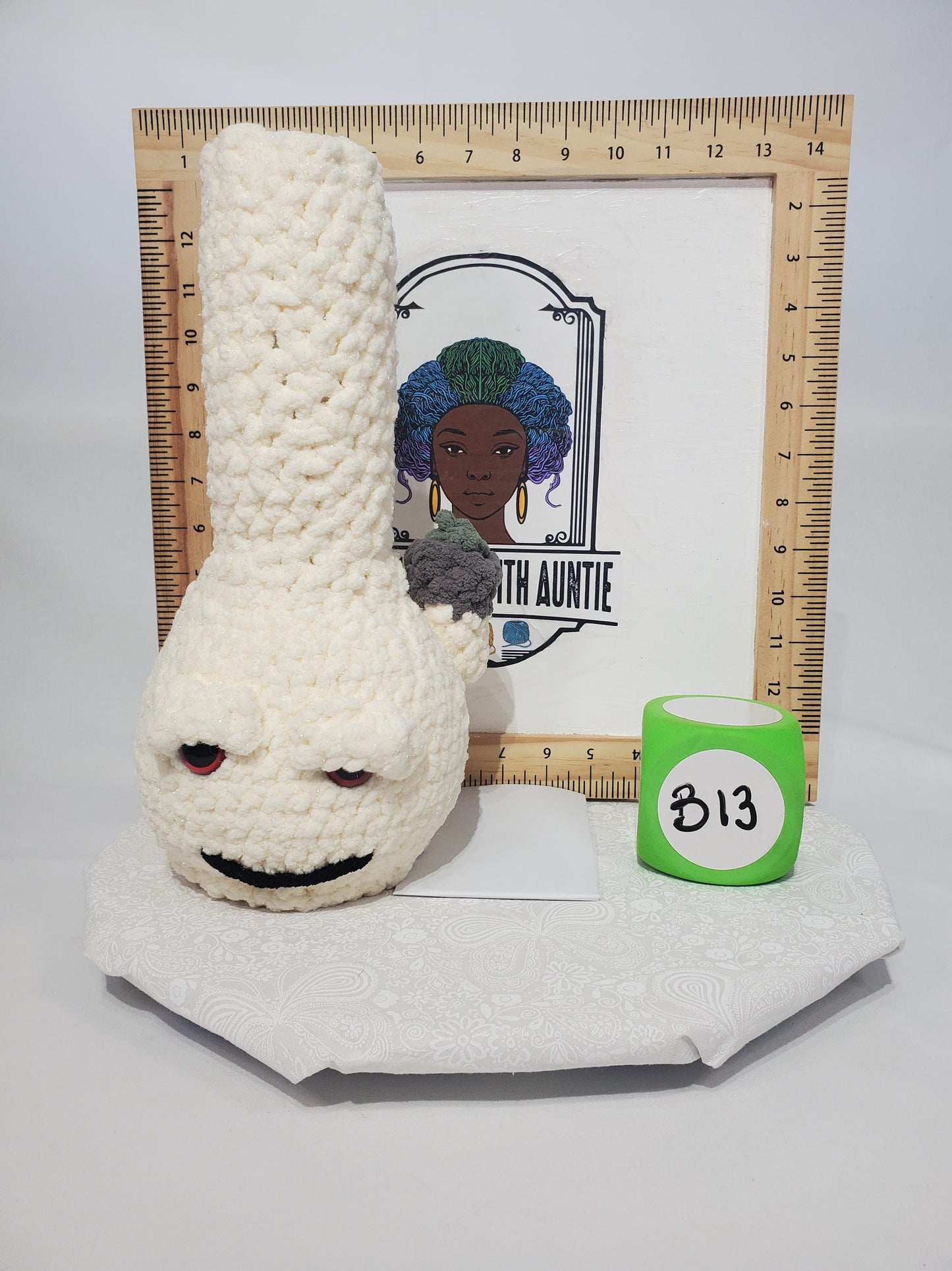 B13: Crochet Bong, Sparkle White, made with 100% polyester, soft blanket yarn, and safety eyes, approx. 12" x 5", 11 oz